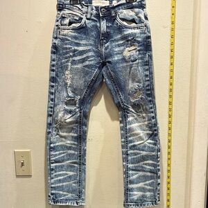 Evolution in Design Distressed Blue Jeans